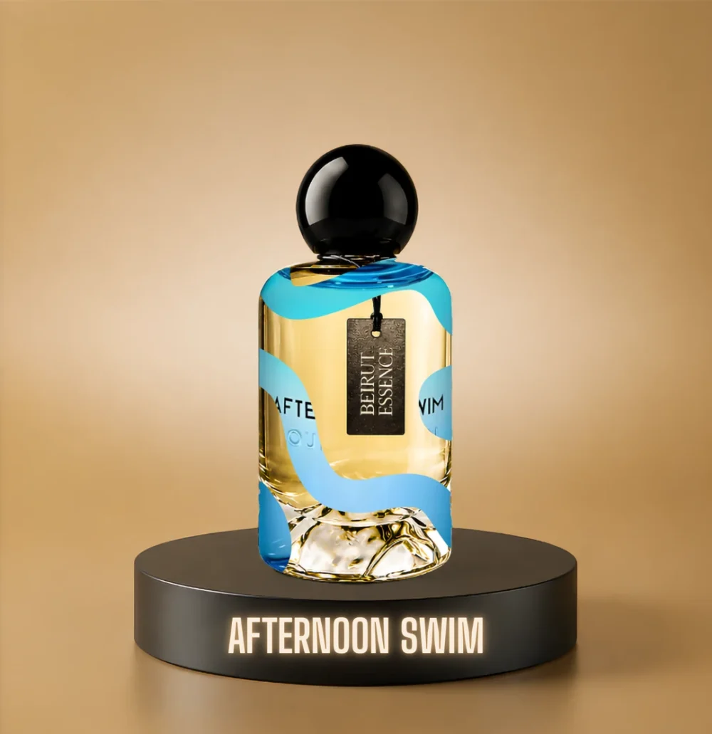 BeirutEssence fragrance inspired by Afternoon Swim, photographed on a dark pedestal with a warm gold background