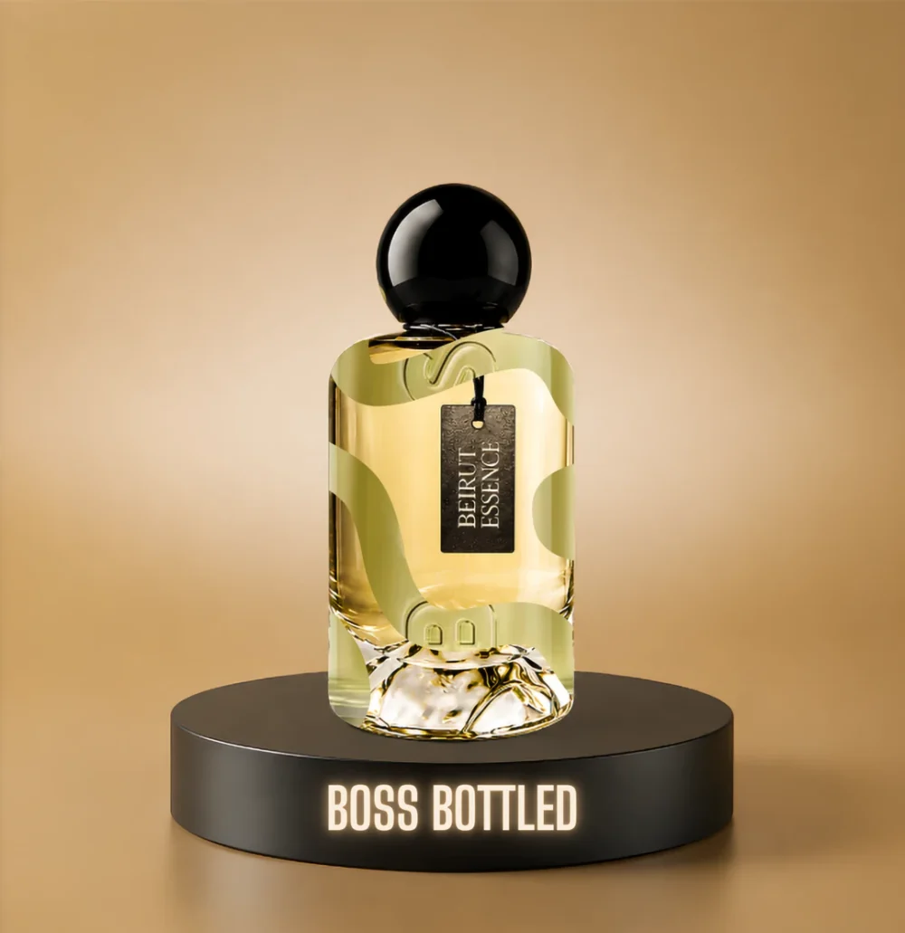 BeirutEssence fragrance inspired by Boss Bottled, photographed on a dark pedestal with a warm gold background