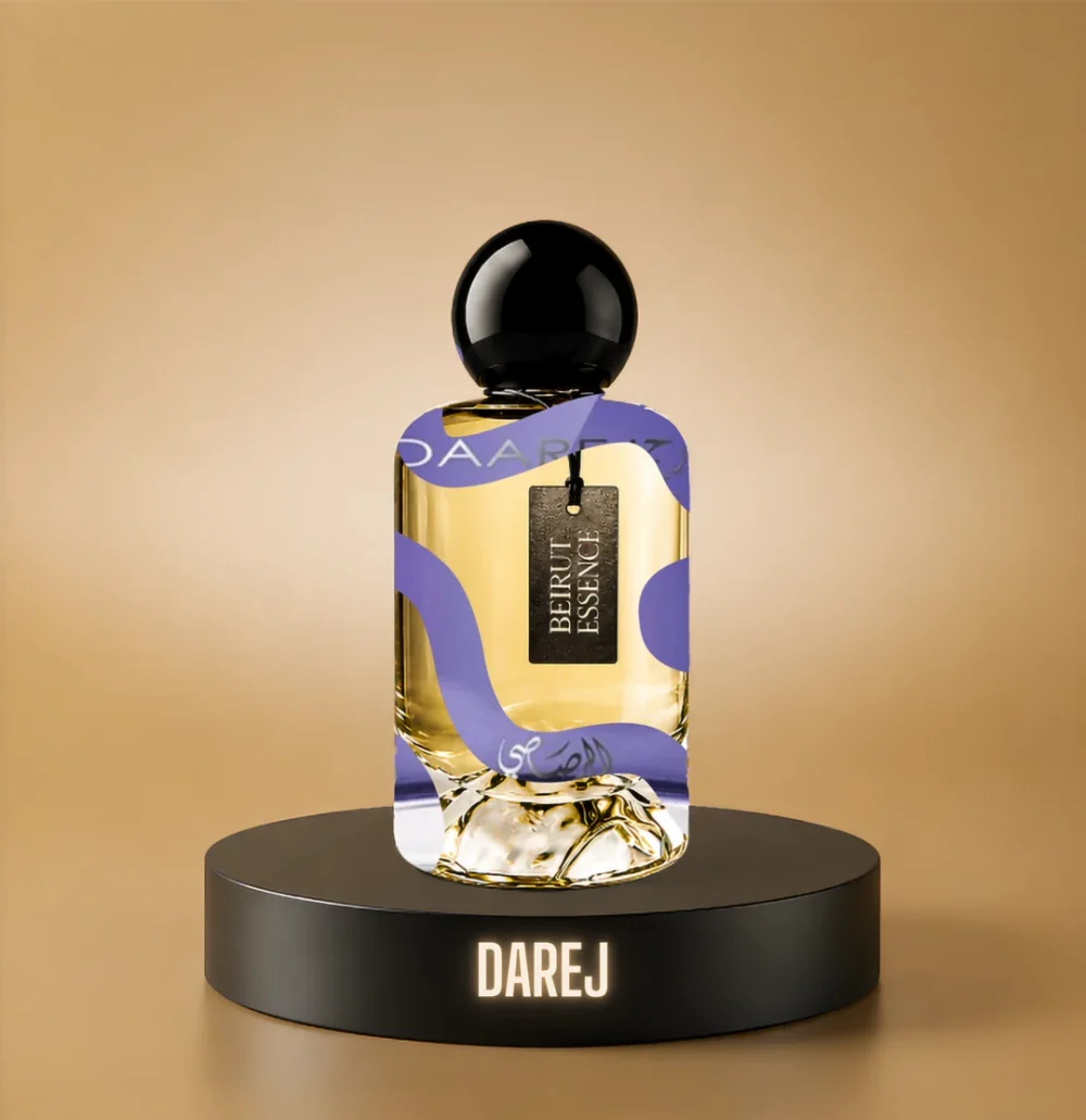 BeirutEssence fragrance inspired by Darej, photographed on a dark pedestal with a warm gold background