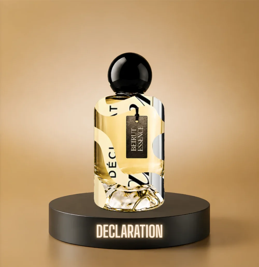 BeirutEssence fragrance inspired by Déclaration, photographed on a dark pedestal with a warm gold background