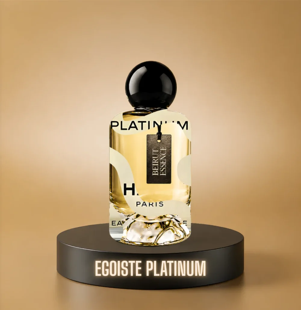 BeirutEssence fragrance inspired by Égoïste Platinum, photographed on a dark pedestal with a warm gold background