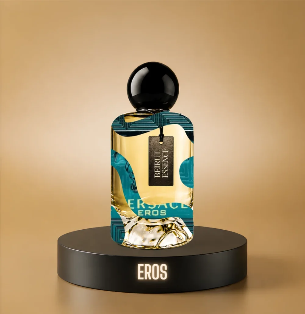 BeirutEssence fragrance inspired by Eros, photographed on a dark pedestal with a warm gold background