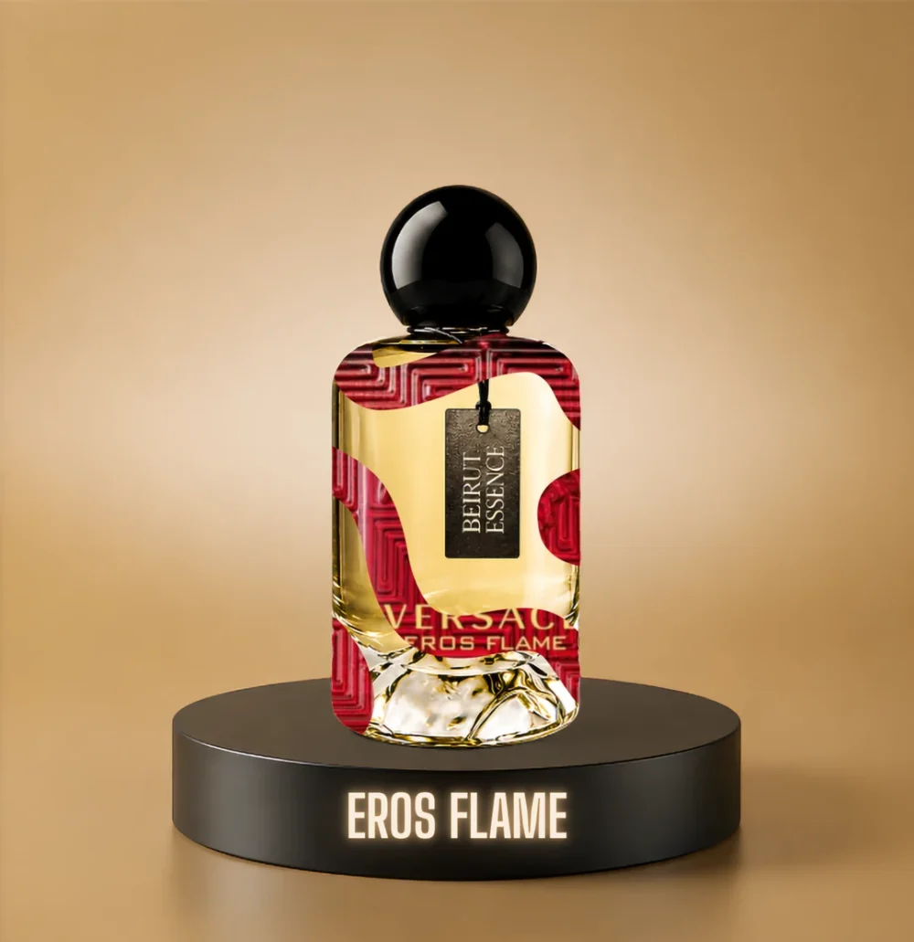 BeirutEssence fragrance inspired by Eros Flame, photographed on a dark pedestal with a warm gold background