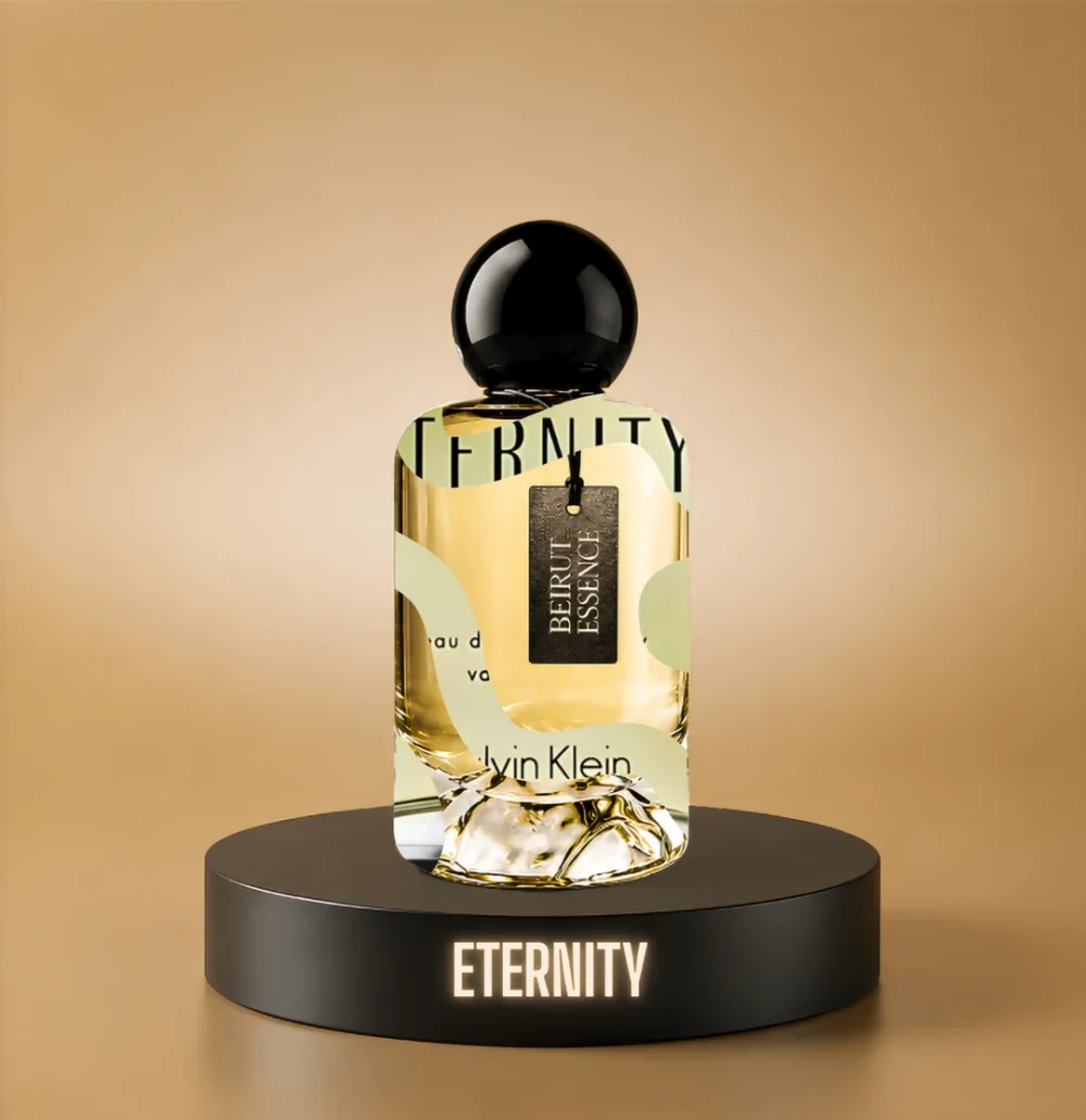 BeirutEssence fragrance inspired by Eternity, photographed on a dark pedestal with a warm gold background