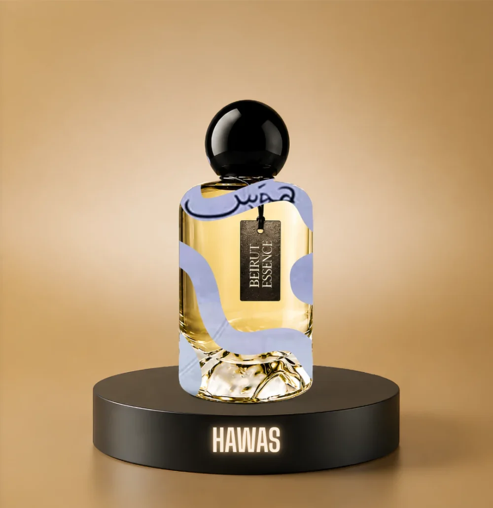 BeirutEssence fragrance inspired by Hawas, photographed on a dark pedestal with a warm gold background