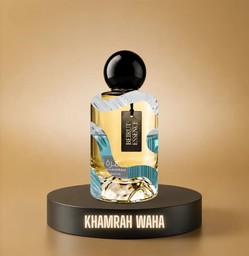 BeirutEssence fragrance inspired by Khamrah Waha, photographed on a dark pedestal with a warm gold background