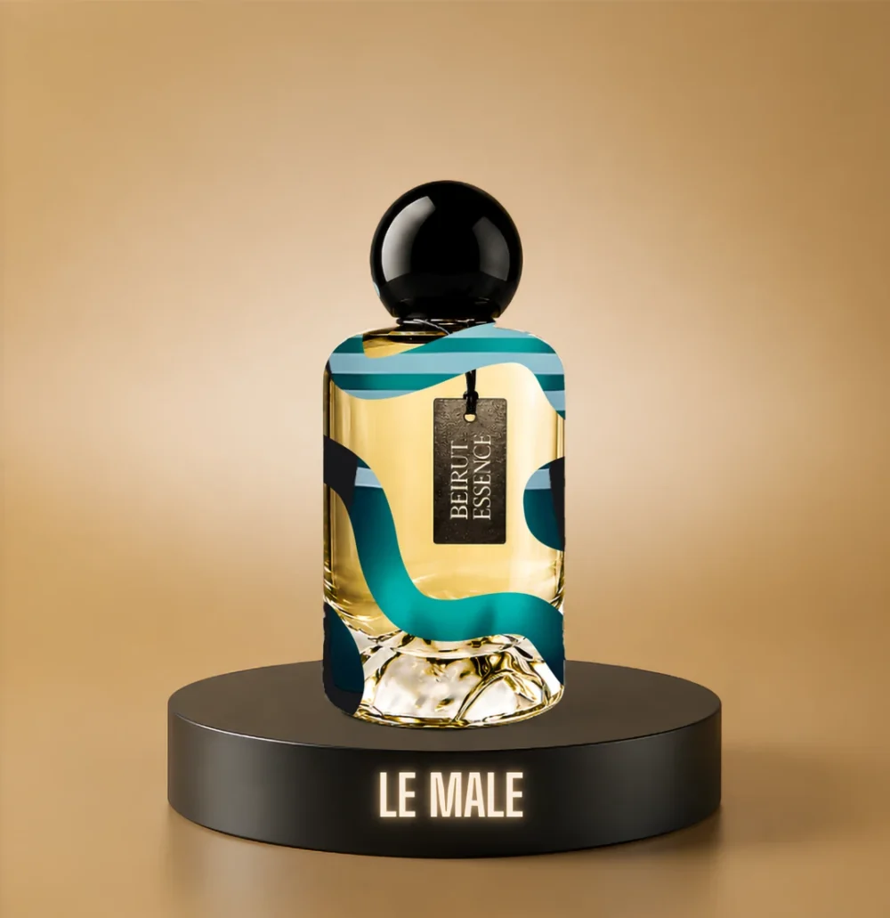 BeirutEssence fragrance inspired by Le Male, photographed on a dark pedestal with a warm gold background