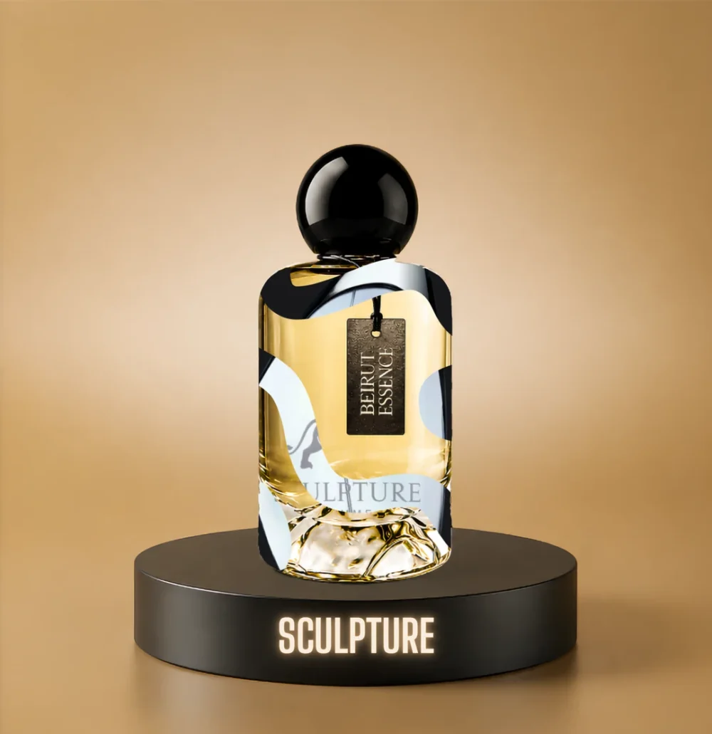BeirutEssence fragrance inspired by Sculpture, photographed on a dark pedestal with a warm gold background