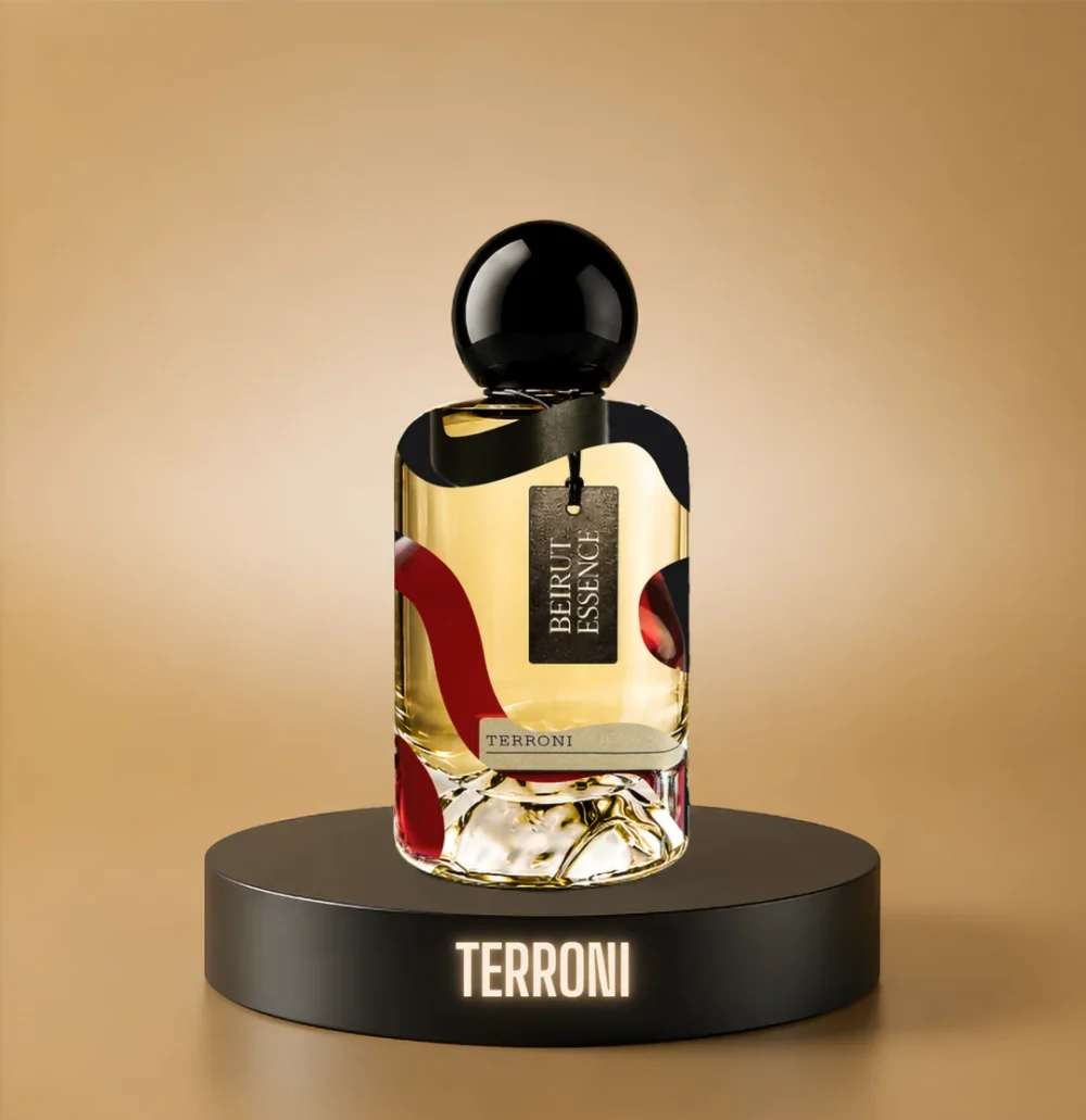 BeirutEssence fragrance inspired by Terroni, photographed on a dark pedestal with a warm gold background
