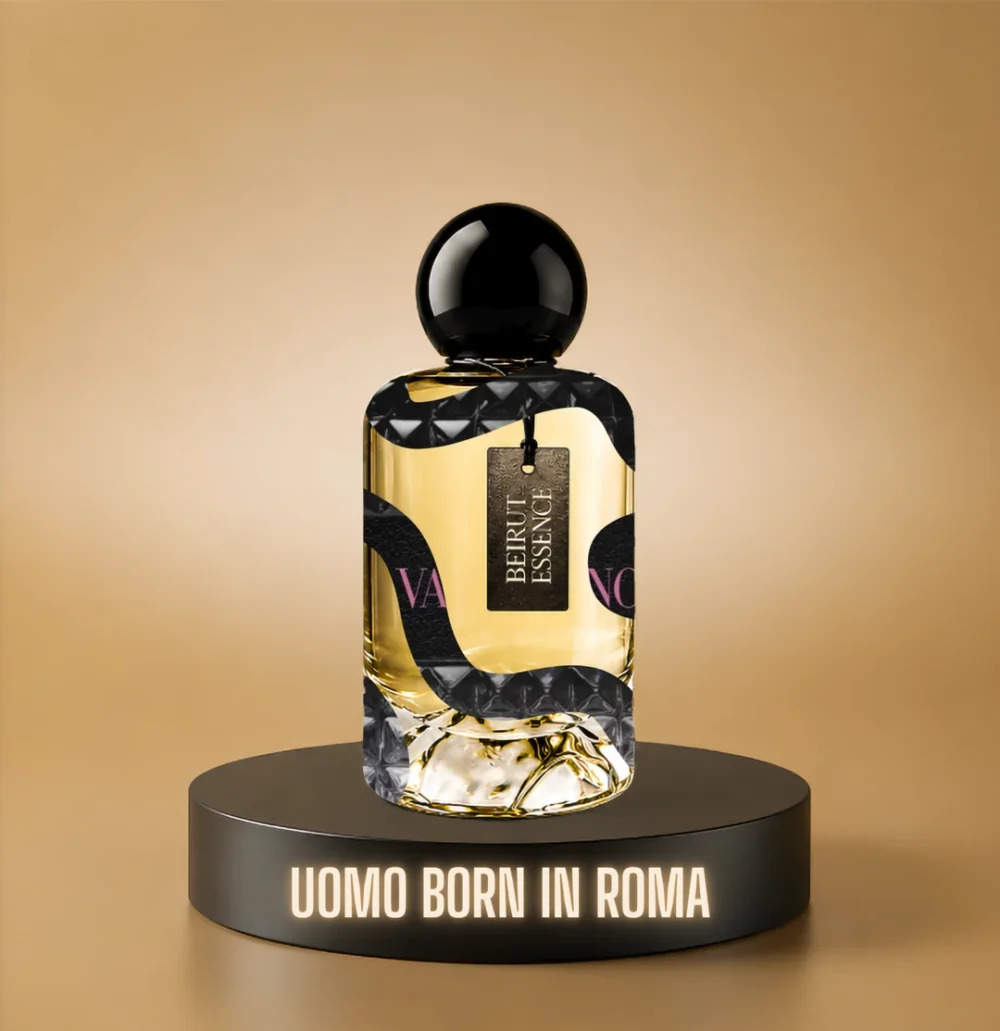 BeirutEssence fragrance inspired by Uomo Born in Roma, photographed on a dark pedestal with a warm gold background