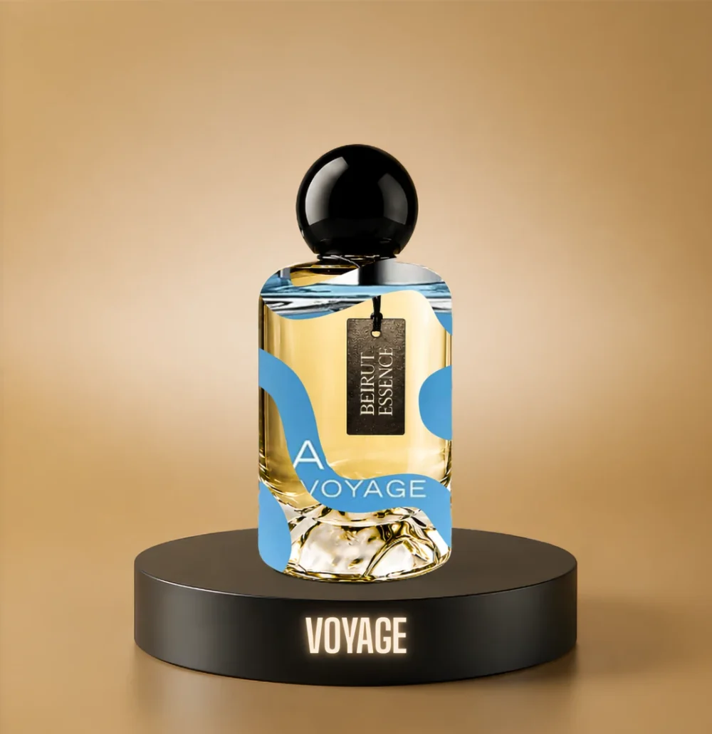 BeirutEssence fragrance inspired by Voyage, photographed on a dark pedestal with a warm gold background