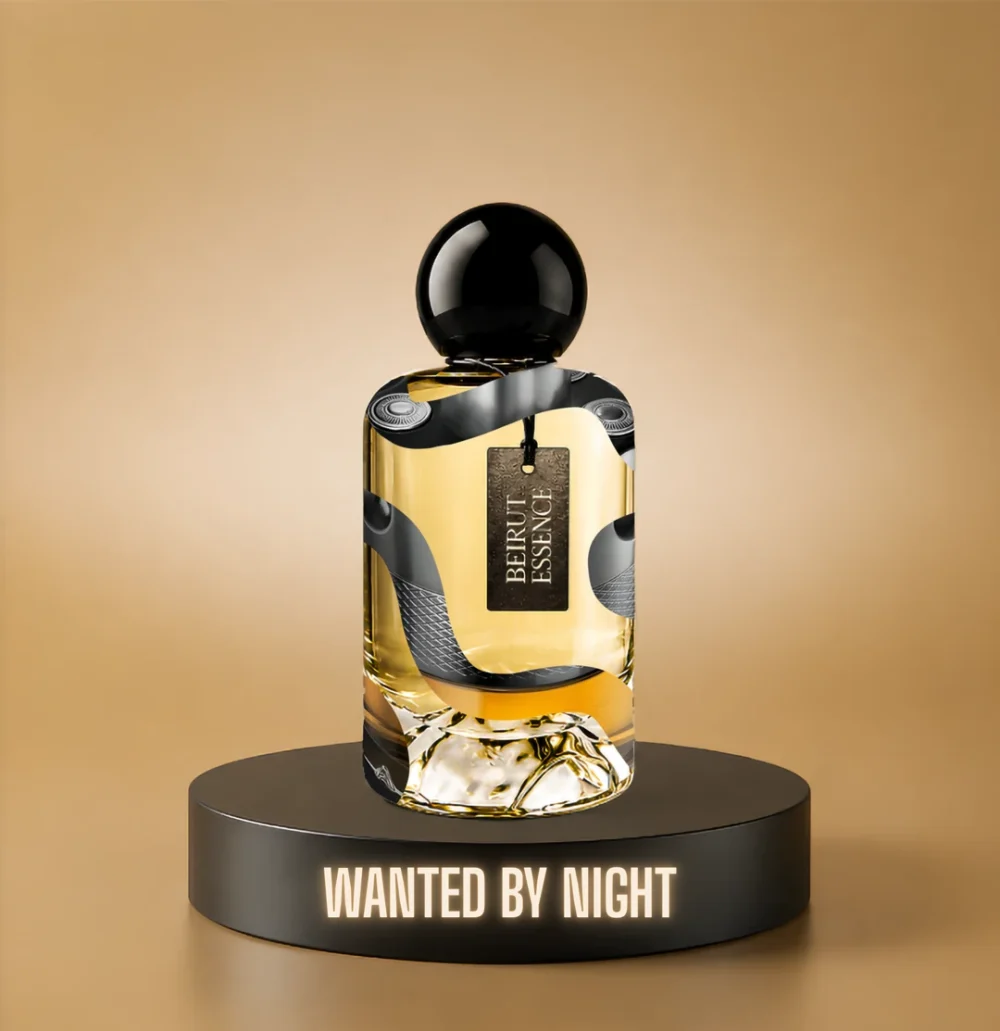 BeirutEssence fragrance inspired by Wanted by Night, photographed on a dark pedestal with a warm gold background