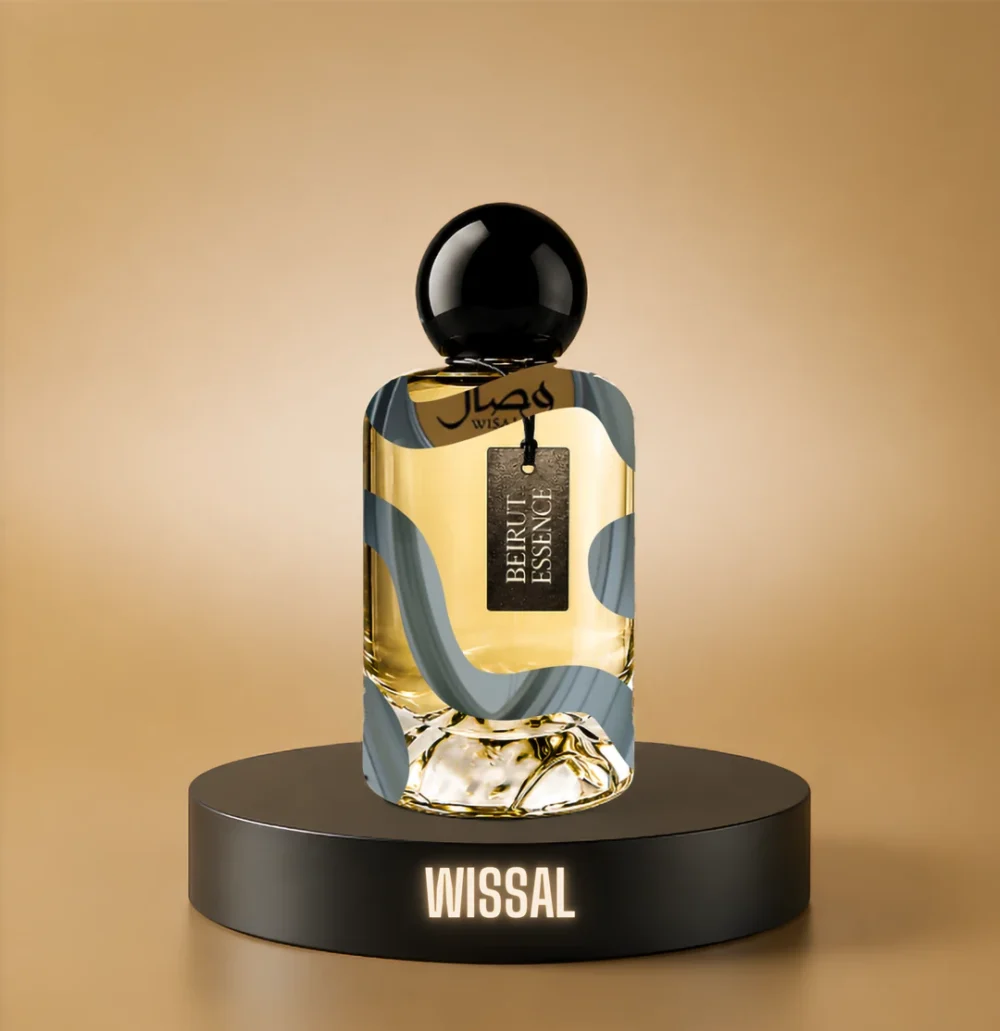 BeirutEssence fragrance inspired by Wissal, photographed on a dark pedestal with a warm gold background